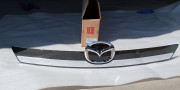 T3Y6-50-810 Накладка ляди (5-ї двері) Mazda